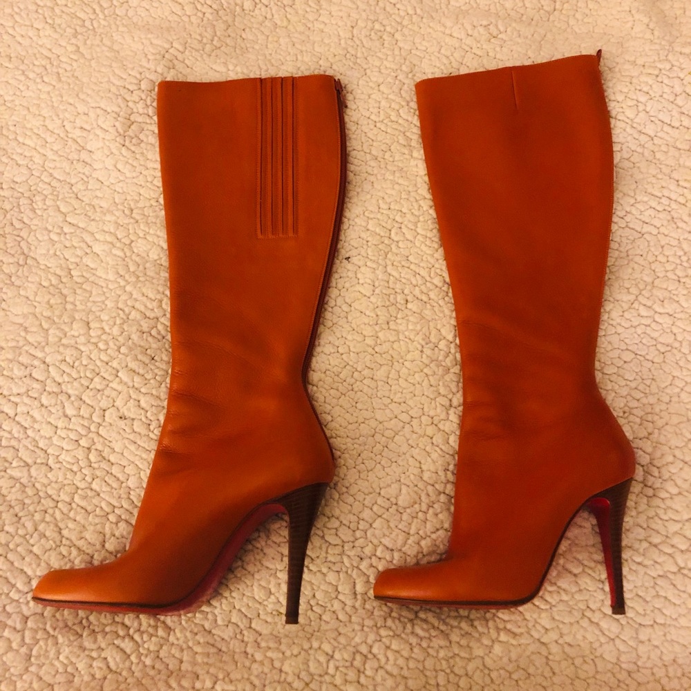 Christian Louboutin knee high boots.
